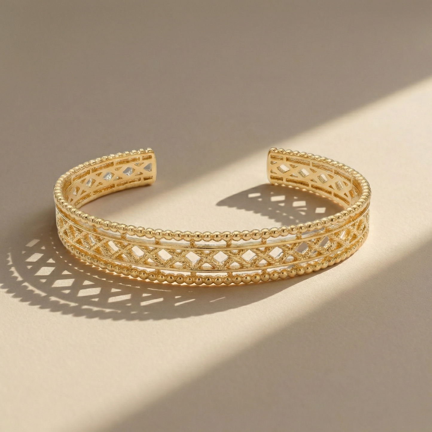 pulsera artesanal de filigrana, hecha a mano en España con plata de ley 925 y un delicado baño de oro 18K.